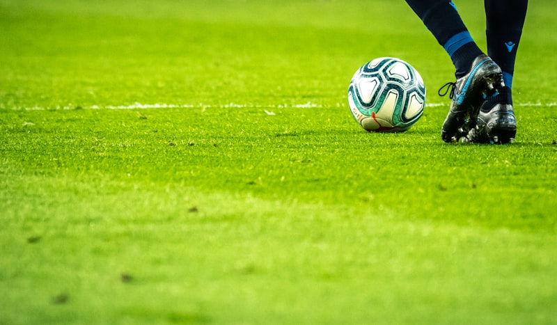 Team sports players gathered on the field during a match